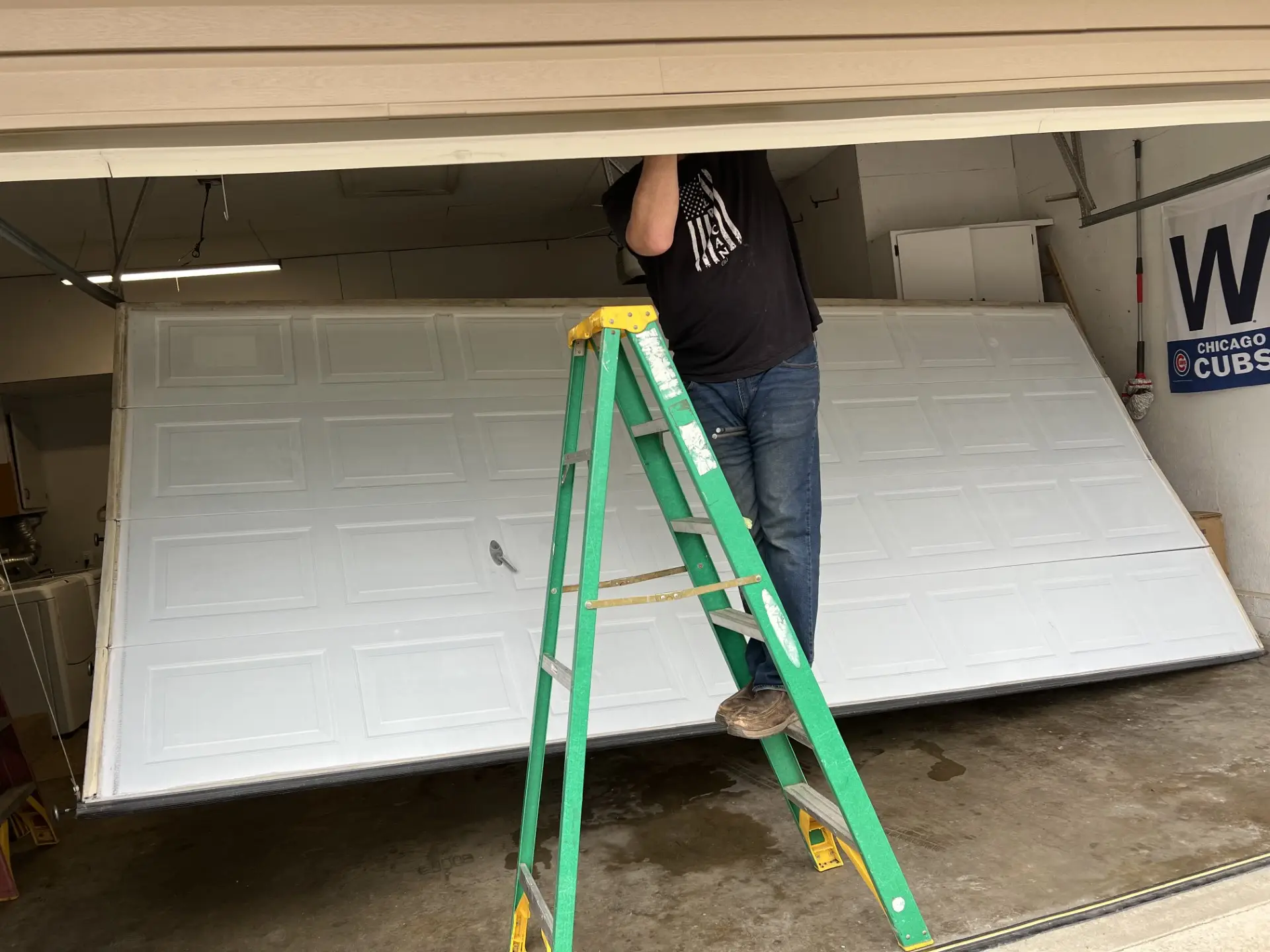 Installing a customer's garage door in Crossville, TN.